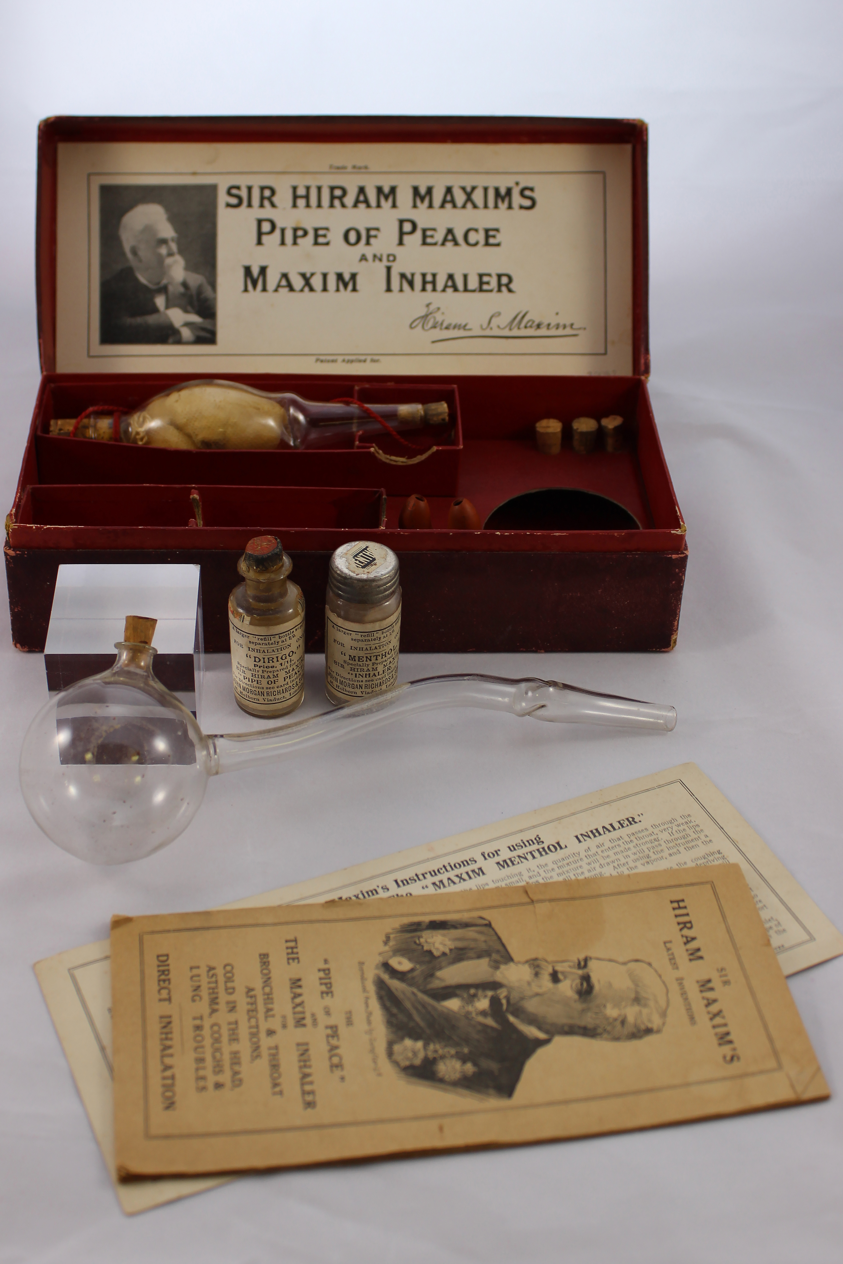 Pipe of Peace and Maxim inhaler and case.