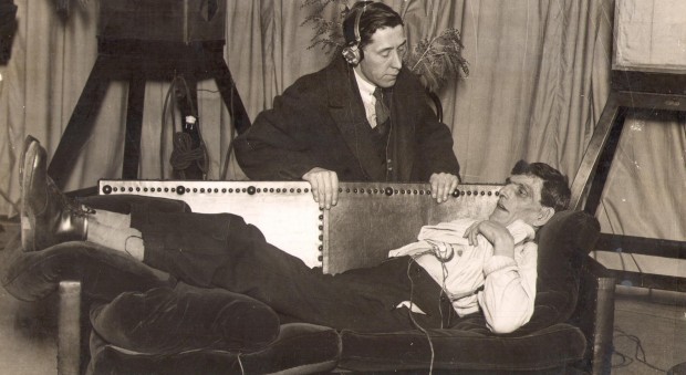 Photograph of Ivan de Burgh Daly's technical assistant with the patient whose heart sounds were being broadcast. November 1924 