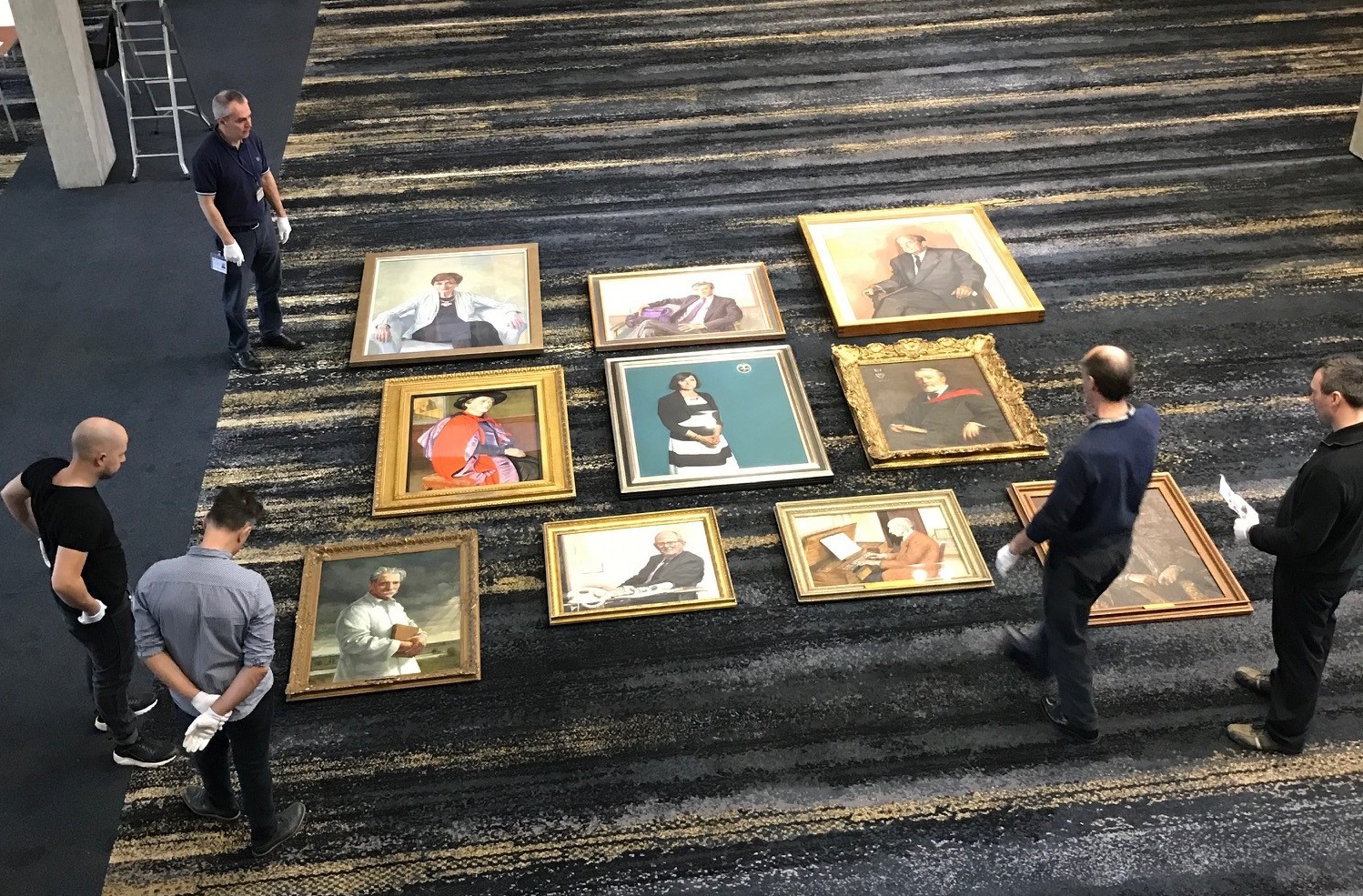 Bird's eye view: arranging the portraits to get the final measurements and spacing