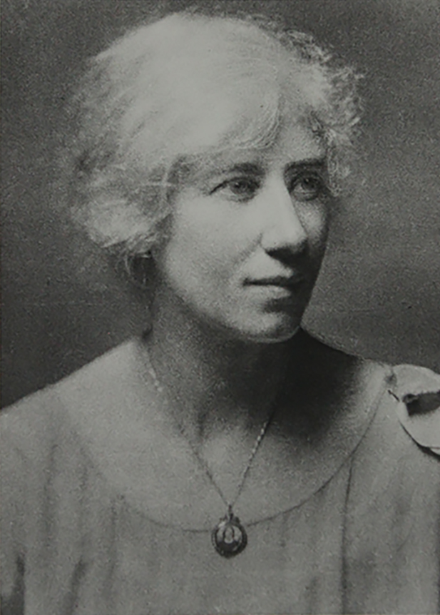 Black and white studio portrait of Julia Bell.