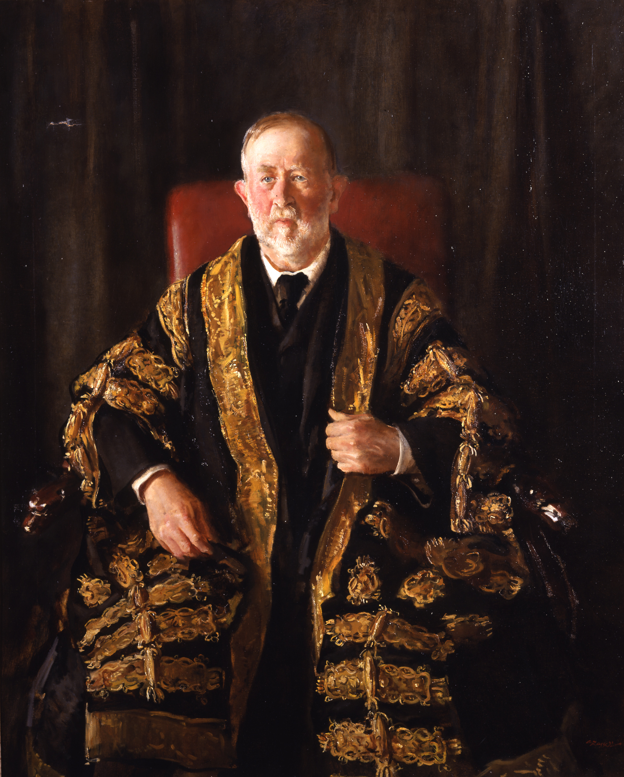 Seated portrait of Norman Moore wearing presidential robes.