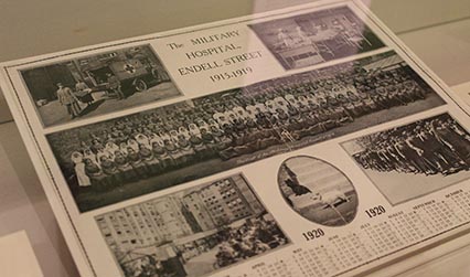 Photograph of a one-page black and white calendar on display in an exhibition