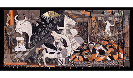 Photograph of a tapestry in shade sof brown and white, showing people, animals and the destruction of war