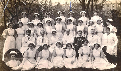 Black and white photograph of a group of hospital staff in uniform