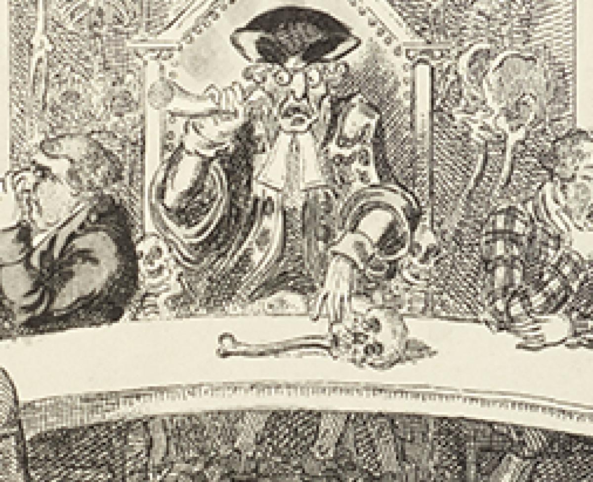 An examining surgeon uses a hearing trumpet sitting in a throne with a skull and cross bones and a mace on the table which is a skull and bone. 