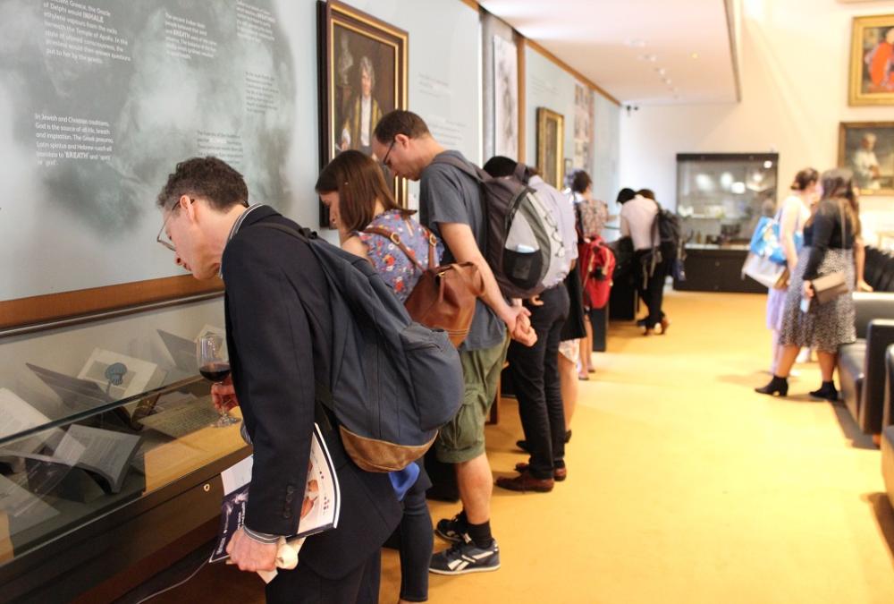 Visitors viewing the catch your breath exhibition
